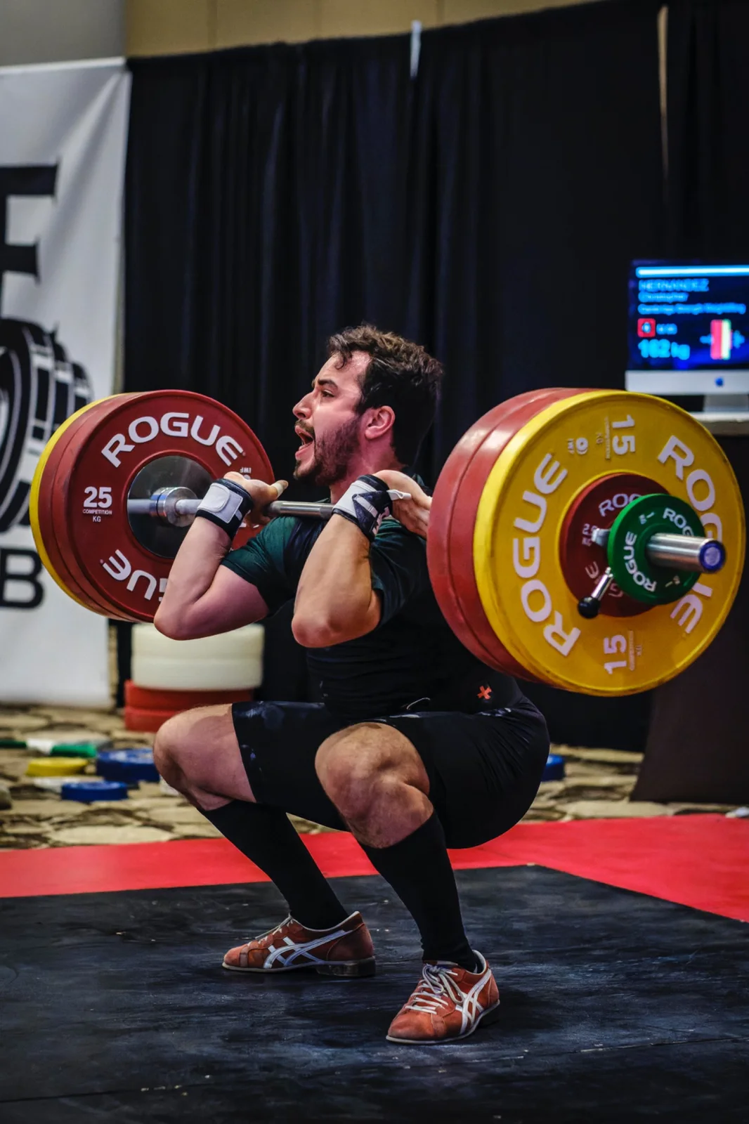 Christopher Hernandez competing in Olympic weightlifting